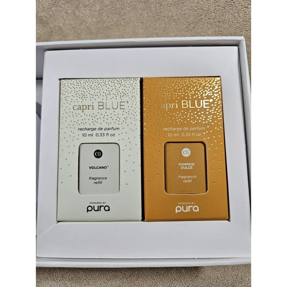 Capri Blue Pura Diffuser Kit - 1 Diffuser + Each Volcano & Pumpkin Dulce Refills